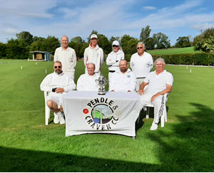 The Spencer Ell players and trophy